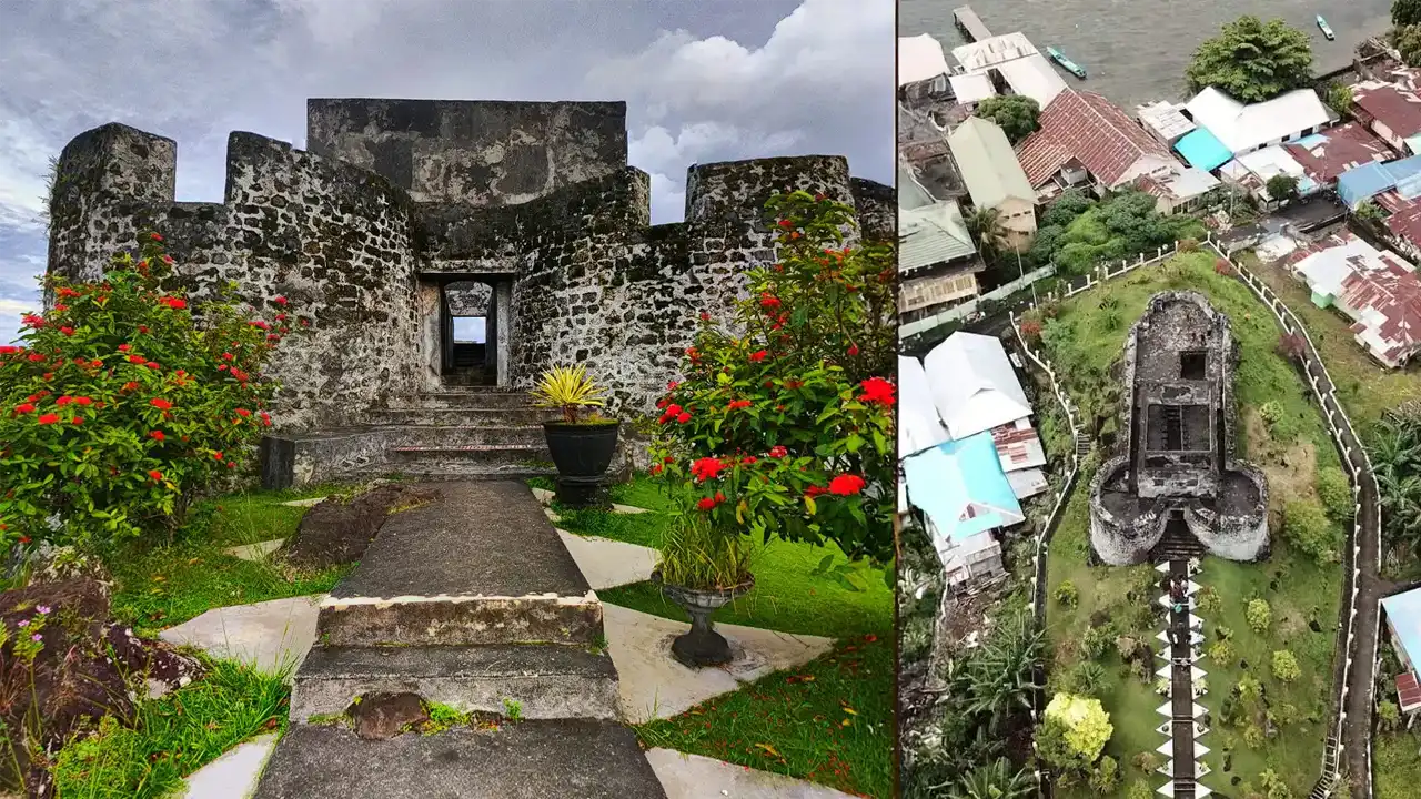 Luftaufnahme der Festung Fort Tolukko auf der Insel Ternate mit Blick auf das Meer und den Vulkan Gamalama im Hintergrund.